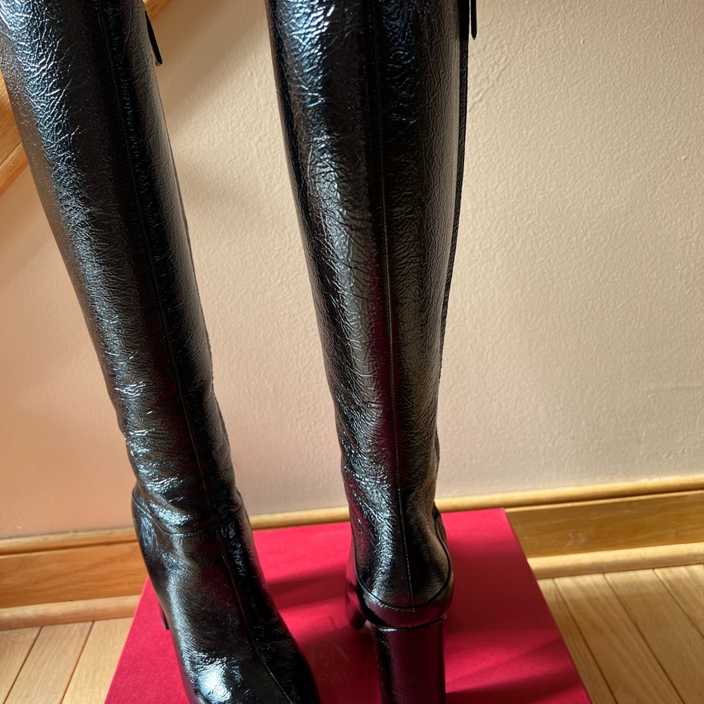 Patent black leather boots . Valentino